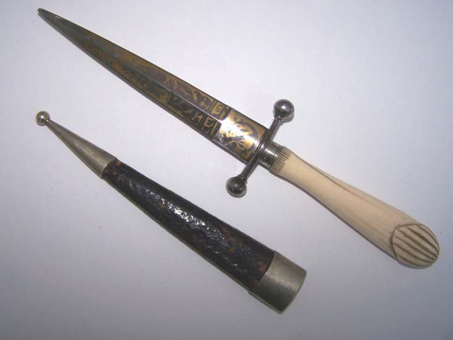 A 19th century American Naval Dirk with Carved Ivory Handle and beautiful gilt engraved blade